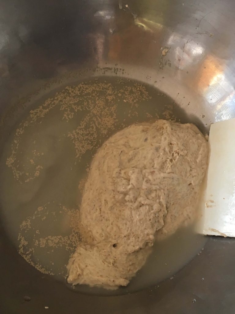 Water, yeast and flour mixture for the dough