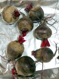 Wrapping wet beets before roasting for Roasted Baby Beets with Watercress Yogurt Sauce