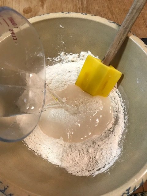 Adding water to flour for no knead bread