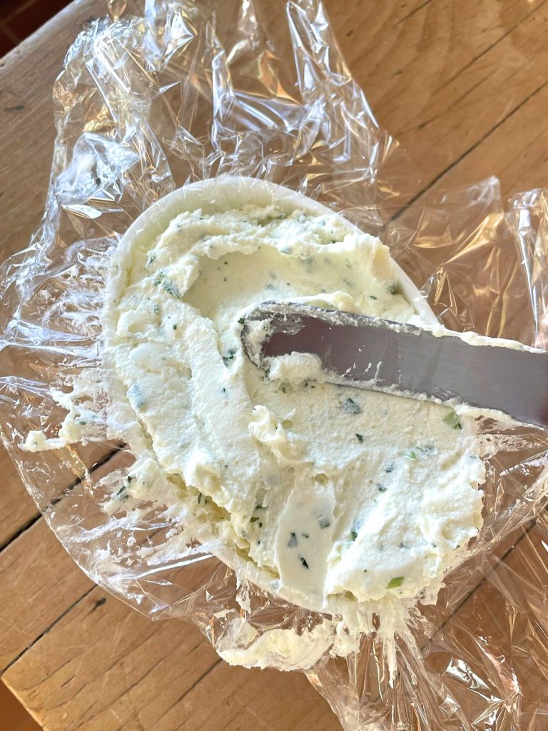 Fresh Garlic Parsley Scallion Cheese Spread packing into mold
