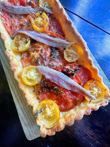 Tomato Cheddar Tart with anchovies